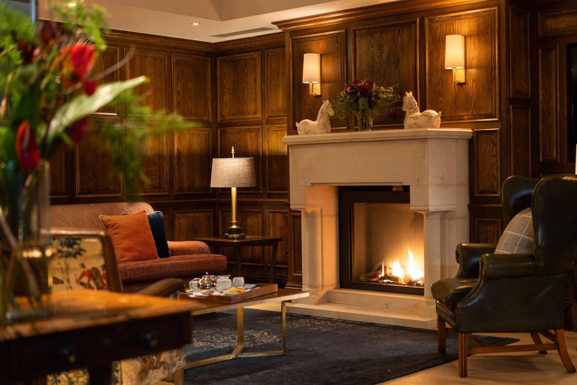 Mount Juliet Estate, Autograph Collection Hotel Thomastown  Buitenkant foto The fireplace in the hotel's lobby